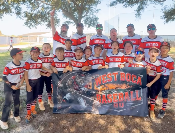 West Boca All-Stars players and coaches with team banner